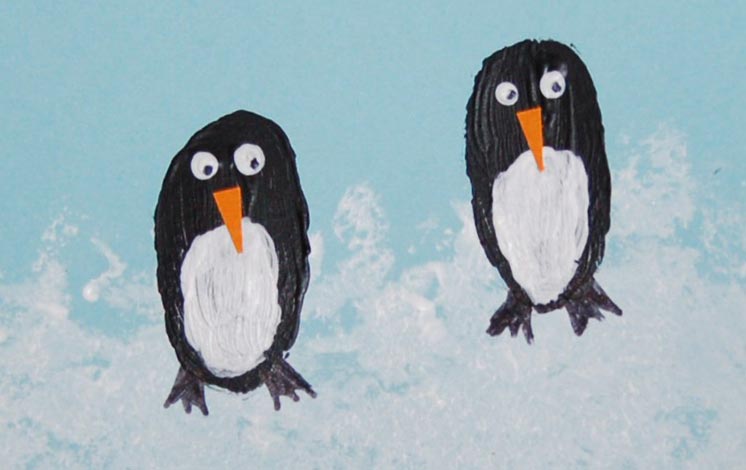 Add the penguins' faces